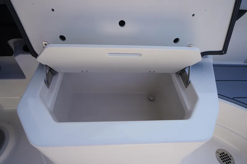 Slide: The Image of 2025 Chaparral 267 SSX boat interior with sleek seating and modern design. - 48