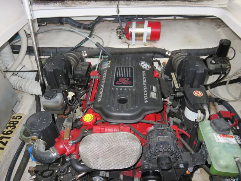 Slide: The Image of Engine compartment of a 2008 Rinker 280 Express Cruiser with Volvo Penta engine. - 24