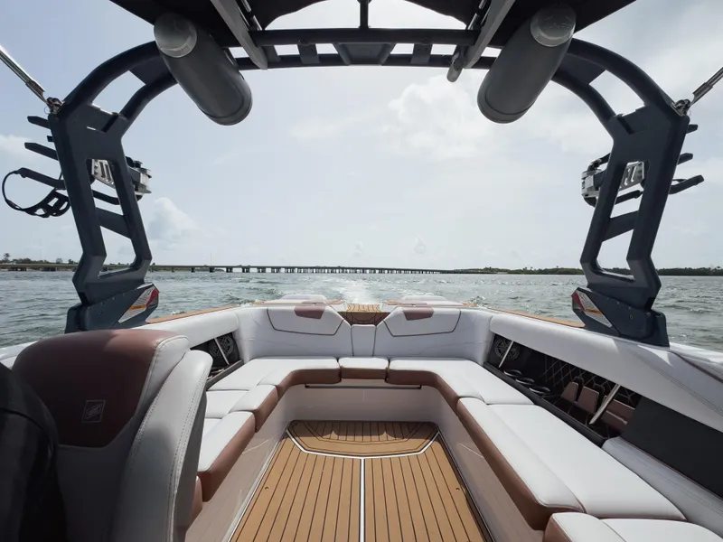Slide: The Image of 2019 Nautique Super Air Nautique GS24 boat interior with spacious seating and sleek design. - 37