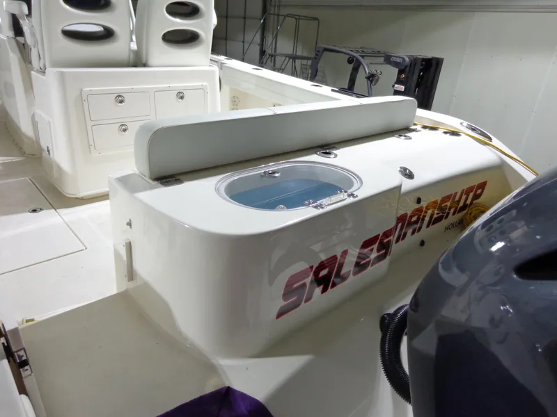 Slide: The Image of 2023 Cobia 280 Center Console boat interior with seating and storage compartments. - 17
