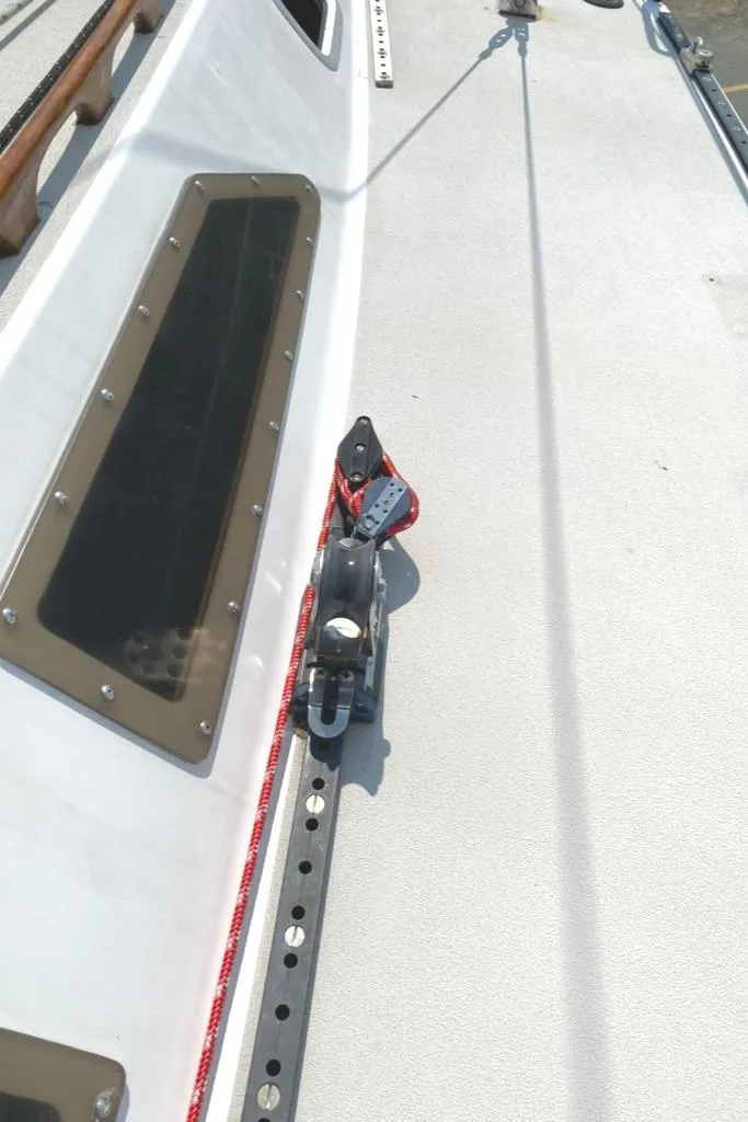 Slide: The Image of Sailboat deck of 1986 Express 37 with rigging and window detail. - 18