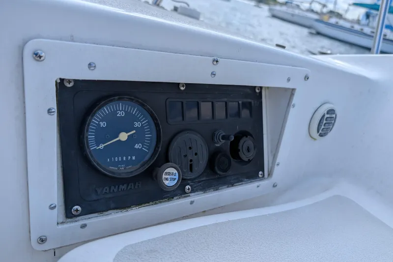 Slide: The Image of Boat control panel with Yanmar tachometer, Express 37, 1986 model, docked at marina. - 20