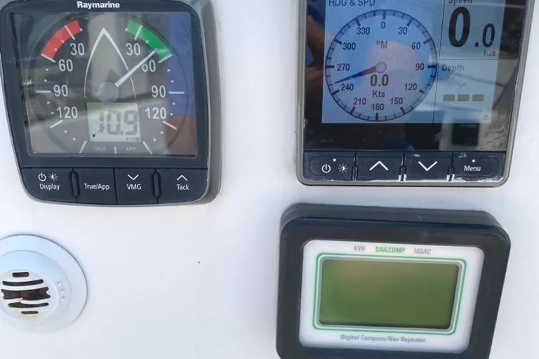 Slide: The Image of Control panel of 1986 Express 37 sailboat with navigation instruments and displays. - 21