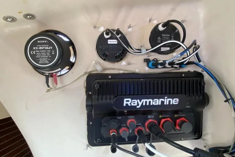 Slide: The Image of Raymarine marine electronics and Sony speaker on Express 37, 1986 model boat. - 40
