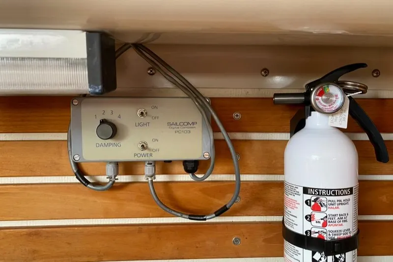 Slide: The Image of Control panel and fire extinguisher on wooden wall, Express 37, 1986 model. - 41