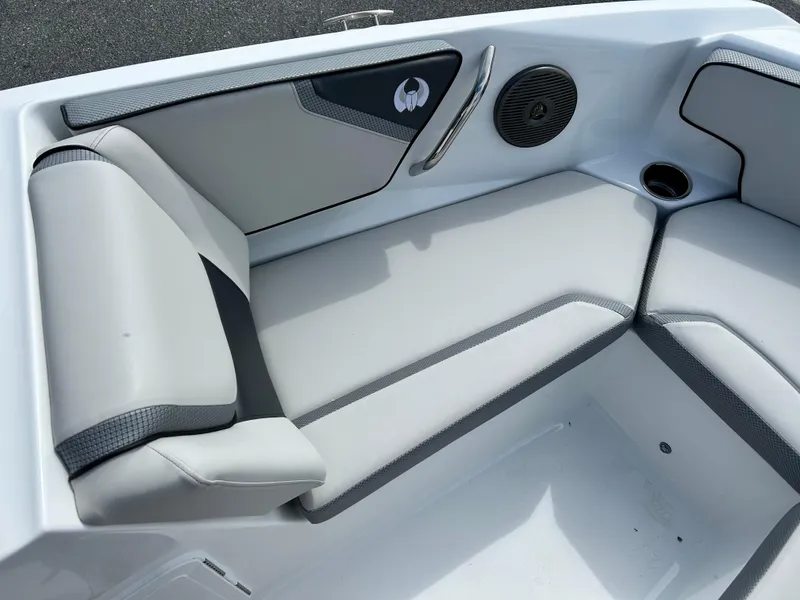 Slide: The Image of Luxurious seating in 2025 Scarab 195 SE boat, featuring sleek design and modern upholstery. - 9