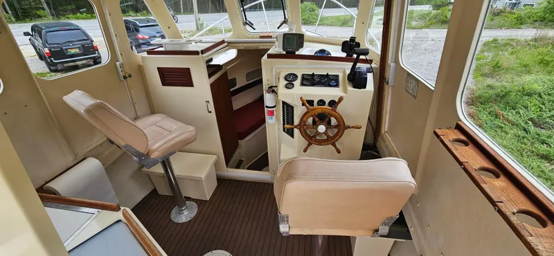 Slide: The Image of Interior of 2001 Rosborough RF-246 Custom Wheelhouse with steering wheel and seating. - 22