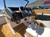 Slide: The Image of 2025 ATX Surf Boats 24 Type-S interior with modern dashboard and steering wheel. - 17