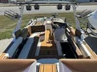 Slide: The Image of 2025 ATX Surf Boats 24 Type-S interior with sleek seating and advanced audio system. - 5