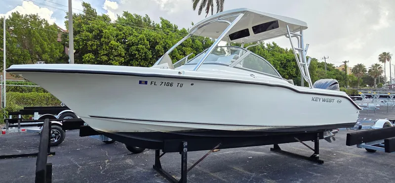 Slide: The Image of 2024 Key West 239 DFS boat on display, featuring sleek design and modern features. - 0