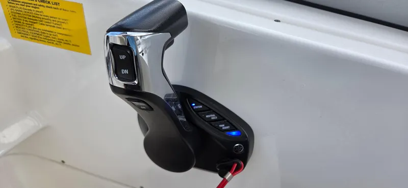 Slide: The Image of Throttle control of 2024 Key West 239 DFS boat, featuring sleek design and functionality. - 17