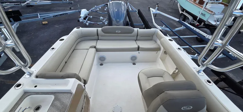 Slide: The Image of 2024 Key West 239 DFS boat interior with spacious seating and modern design. - 4