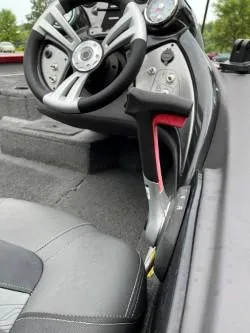 Slide: The Image of 2020 Tracker Pro Team 175 TXW TE boat interior with steering wheel and throttle controls. - 3