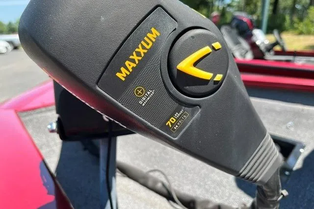 Slide: The Image of Close-up of a Maxxum motor on a 2020 Tracker Pro Team 175 TXW TE boat. - 9