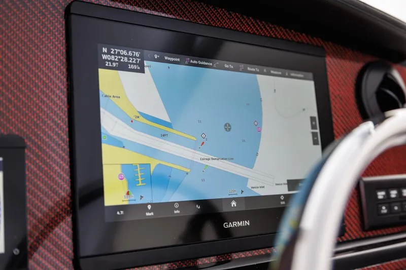 Slide: The Image of Garmin navigation display on 2026 Solara S-250 DC boat dashboard. - 11