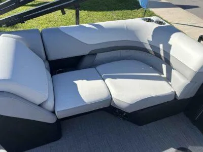 Slide: The Image of Luxurious seating on 2025 Lowe SS 230 boat with cup holders and modern design. - 11