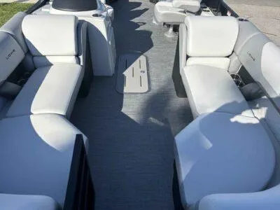 Slide: The Image of 2025 Lowe SS 230 boat interior with spacious seating and modern design. - 8