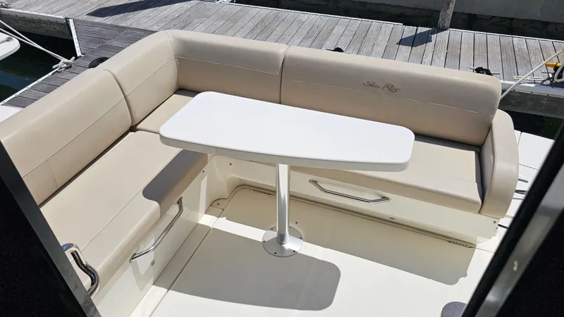 Slide: The Image of Luxurious seating area on 2016 Sea Ray 470 Sundancer yacht with table. - 29