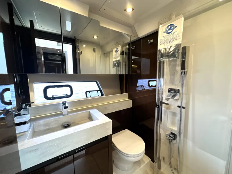 Slide: The Image of Luxurious bathroom in 2022 Prestige 520 yacht with modern fixtures and elegant design. - 46