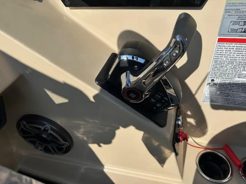 Slide: The Image of Control panel of 2025 Sylvan G-3 CLZ DC boat with throttle lever and safety instructions. - 10