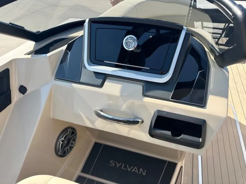 Slide: The Image of 2025 Sylvan G-3 CLZ DC boat dashboard with modern controls and sleek design. - 12
