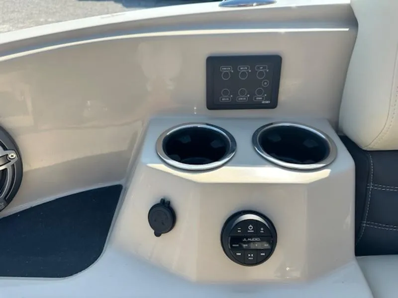 Slide: The Image of Dashboard of 2025 Sylvan G-3 CLZ DC with cup holders and control panel. - 6