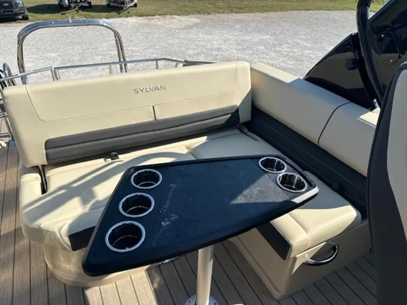Slide: The Image of Luxurious seating area on 2025 Sylvan G-3 CLZ DC boat with cupholders. - 9