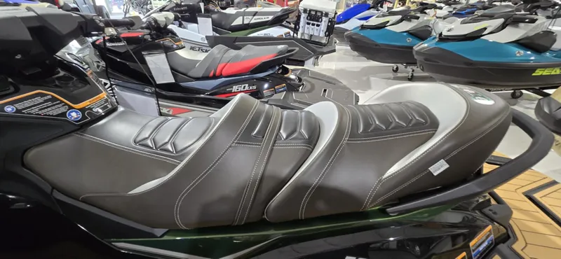 Slide: The Image of 2025 Kawasaki JetSki Ultra 160LX with sleek, ergonomic seating in a showroom display. - 6