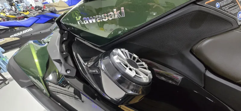 Slide: The Image of 2025 Kawasaki JetSki Ultra 160LX close-up, showcasing sleek design and speaker detail. - 7