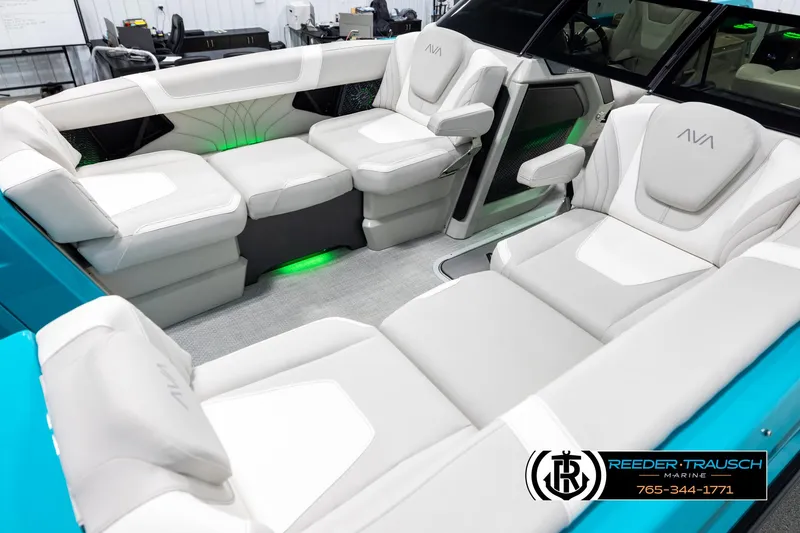 Slide: The Image of Luxurious interior of 2025 Avalon 2585 Excal VRBW boat with plush seating and ambient lighting. - 10