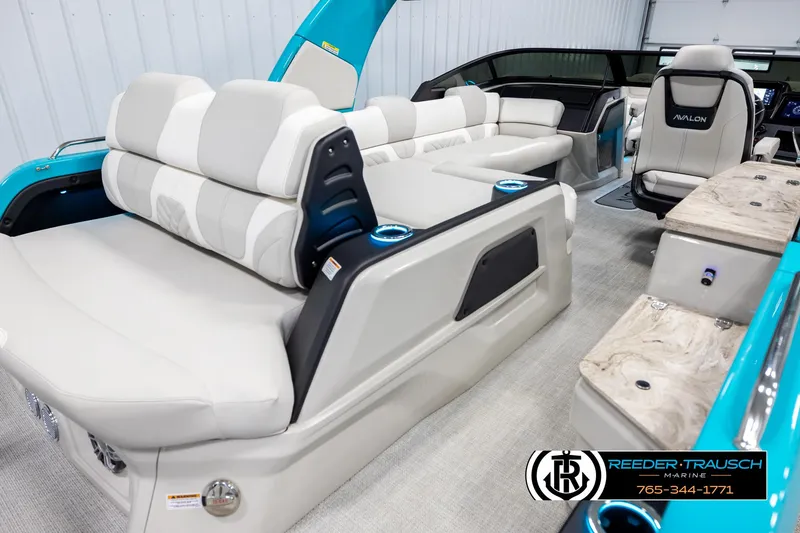 Slide: The Image of Luxurious interior of 2025 Avalon 2585 Excal VRBW boat with plush seating and modern design. - 12