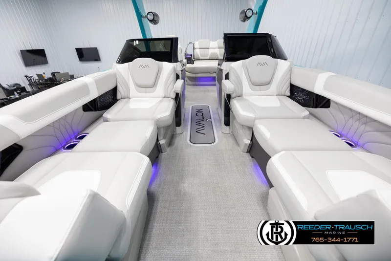 Slide: The Image of Luxurious interior of 2025 Avalon 2585 Excal VRBW pontoon boat with plush seating. - 13