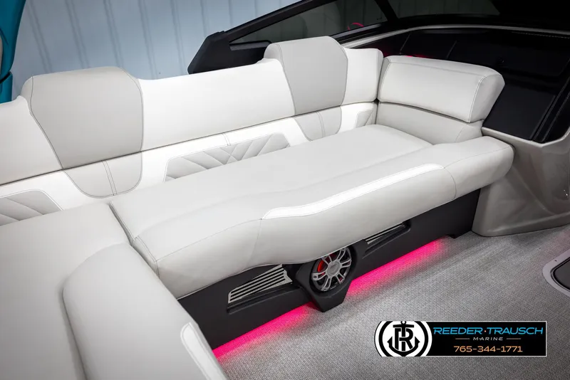 Slide: The Image of Luxurious seating in the 2025 Avalon 2585 Excal VRBW boat with ambient lighting. - 25