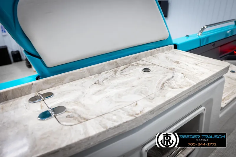 Slide: The Image of Luxurious interior of 2025 Avalon 2585 Excal VRBW boat with marble countertop. - 29