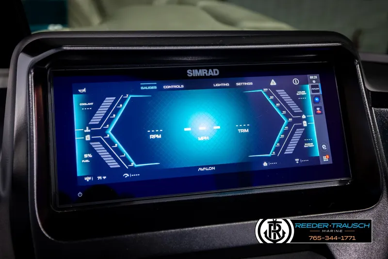 Slide: The Image of 2025 Avalon 2585 Excal VRBW dashboard display with Simrad interface, showing gauges and settings. - 38