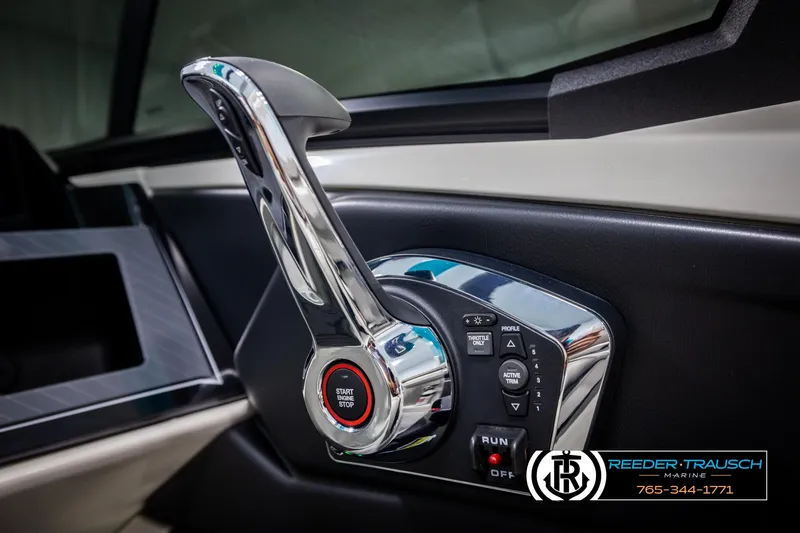 Slide: The Image of 2025 Avalon 2585 Excal VRBW boat throttle control with start/stop button, Reeder-Trausch Marine branding. - 40