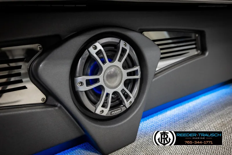 Slide: The Image of Speaker system in 2025 Avalon 2585 Excal VRBW boat, featuring modern design and blue lighting. - 49