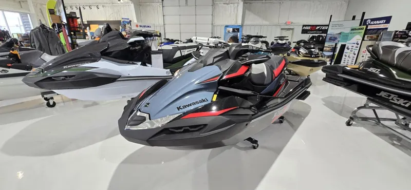 Slide: The Image of 2025 Kawasaki Jetski Ultra 160 LX-S displayed in showroom, sleek design, modern features. - 2