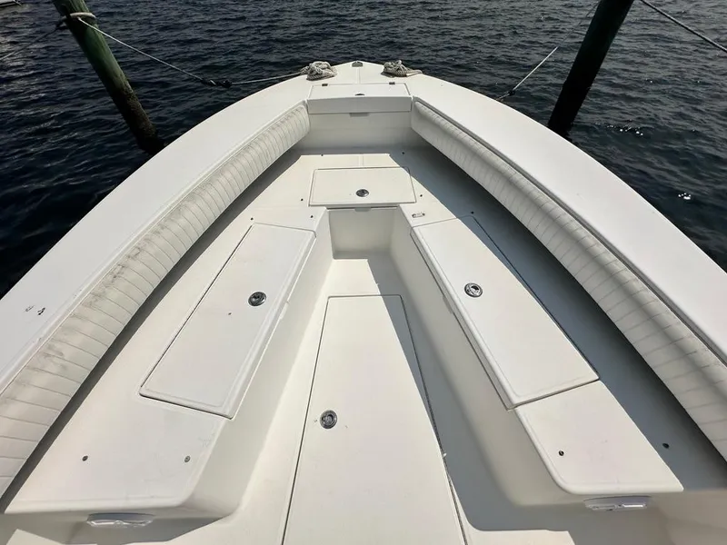 Slide: The Image of 2005 Regulator 26 Forward Seating boat with spacious deck and storage compartments. - 8