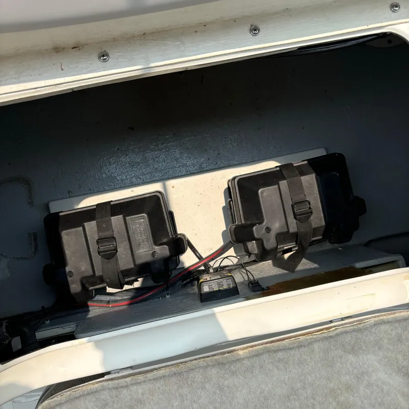 Slide: The Image of Battery compartment of 2020 Splendor Odyssey 220 boat with secured battery boxes. - 13
