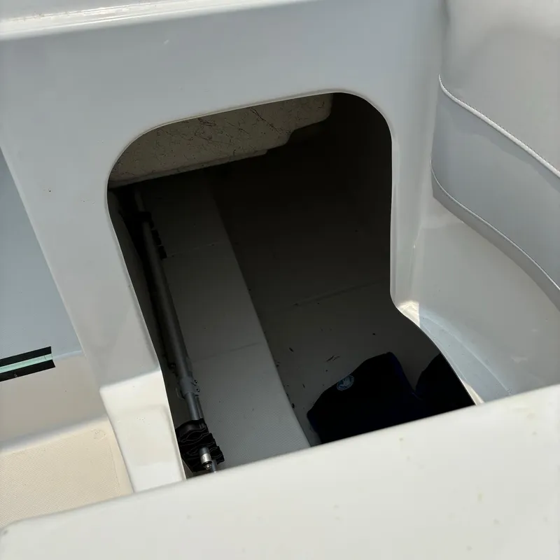 Slide: The Image of Storage compartment in a 2020 Splendor Odyssey 220 boat, showcasing interior space. - 14