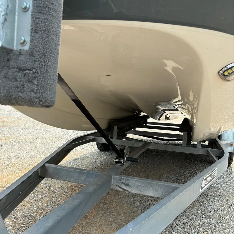 Slide: The Image of 2020 Splendor Odyssey 220 boat on trailer, close-up view of hull and support. - 3