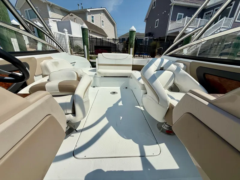 Slide: The Image of 2011 Formula 270 Bowrider interior with white seating and open deck. - 5