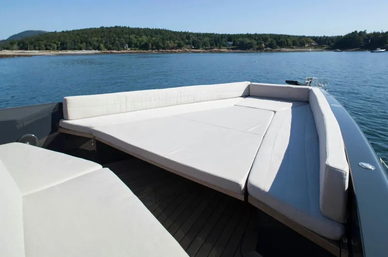 Slide: The Image of Luxurious 2016 Wally Wallypower 52 yacht with spacious sunbathing deck on serene water. - 11
