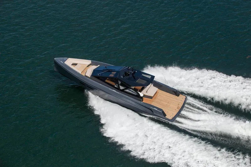 Slide: The Image of 2016 Wally Wallypower 52 yacht cruising on open water, showcasing sleek design and speed. - 3