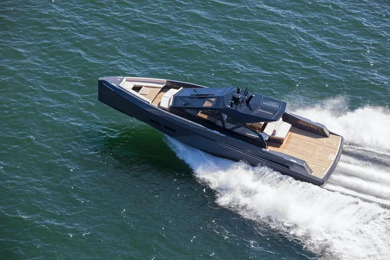 Slide: The Image of 2016 Wally Wallypower 52 yacht cruising on open water, showcasing sleek design and speed. - 4