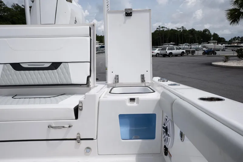 Slide: The Image of 2026 Blackfin 262 HB boat interior with open storage compartments and seating. - 12