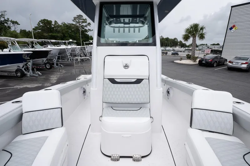 Slide: The Image of 2026 Blackfin 262 HB boat interior with white seating and modern design. - 23