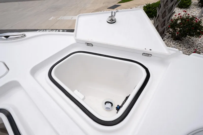 Slide: The Image of Open storage compartment on 2026 Blackfin 262 HB boat deck. - 27