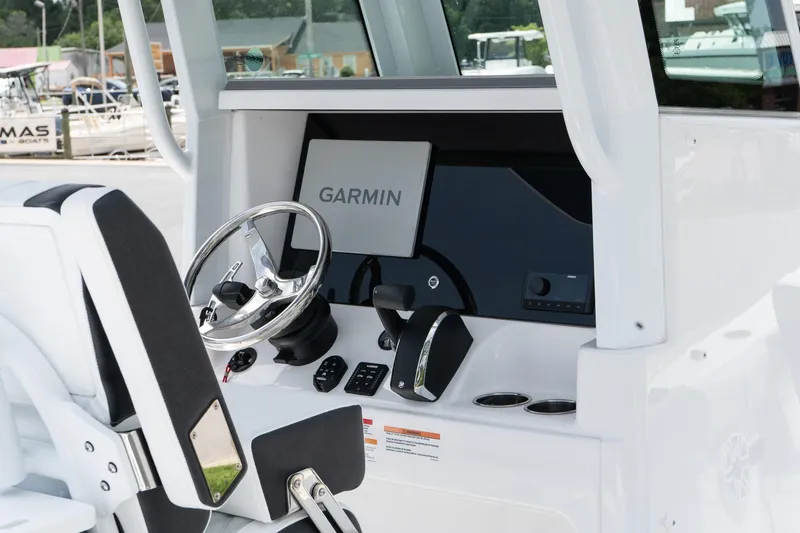Slide: The Image of 2026 Blackfin 262 HB boat dashboard with Garmin navigation system. - 6